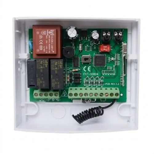 Rolling shutter tubular motor controller board in a white enclosure, showing screw terminals, timer adjustment dials and the aerial wire for the 433.92 MHz receiver