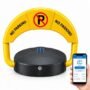 Carbon steel smart parking lock with its arm raised to 445 mm on a concrete parking bay, shown with its remote control